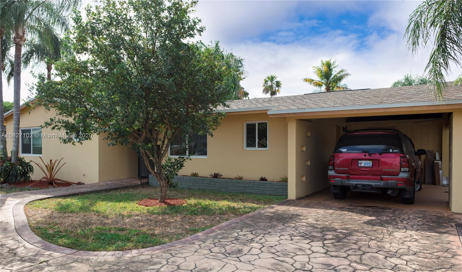 3198 Arthur Terrace Hollywood, FL 33021 - Photo 17 of 18 a view of a car in front of a house