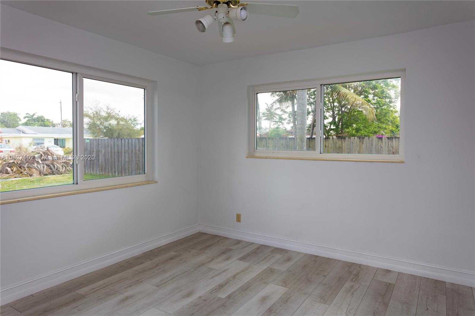 3198 Arthur Terrace Hollywood, FL 33021 - Photo 10 of 18 a view of an empty room with a window