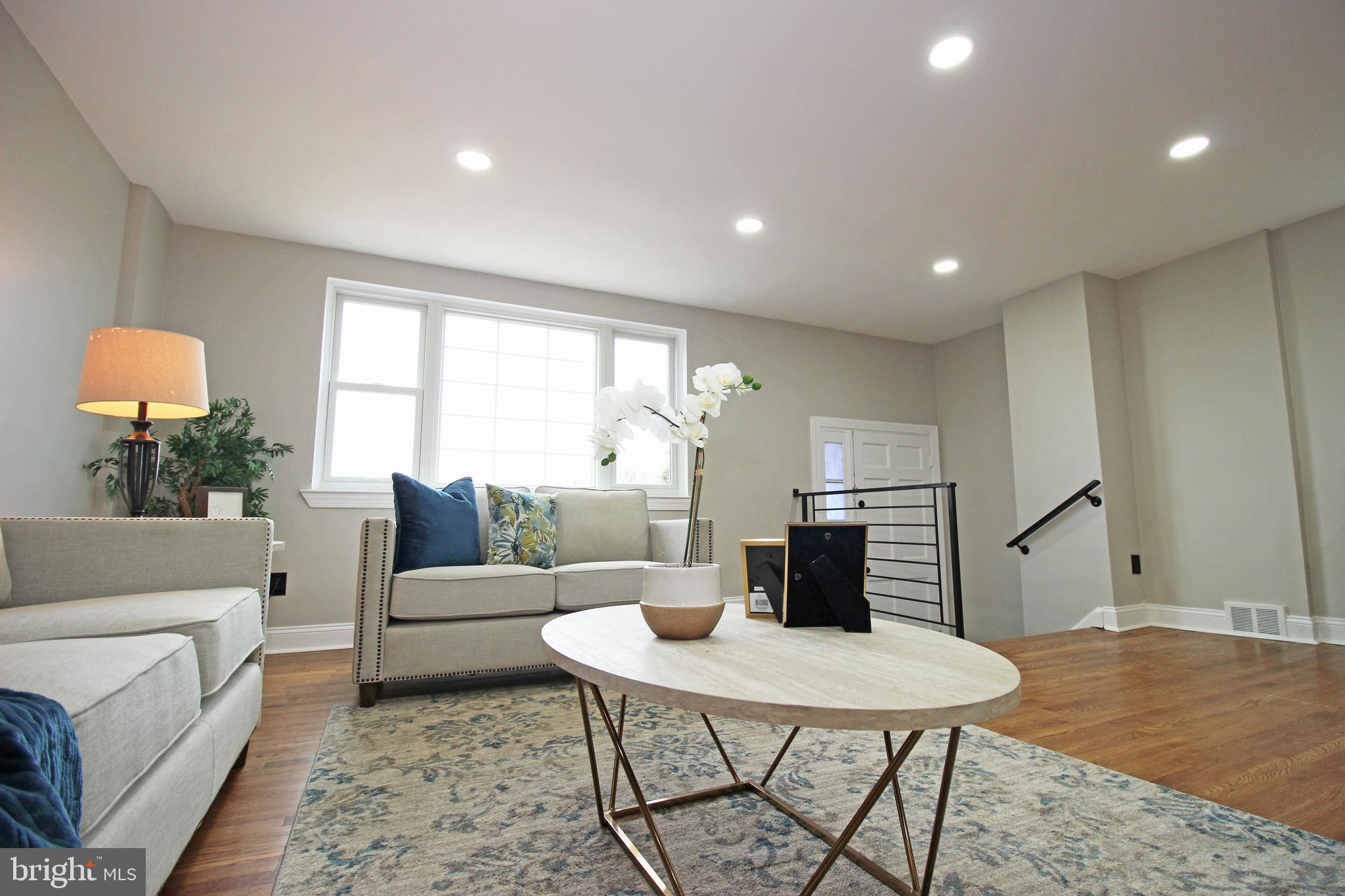 4017 Gideon Road Brookhaven, PA 19015 - Photo 11 of 54 a living room with furniture and a table