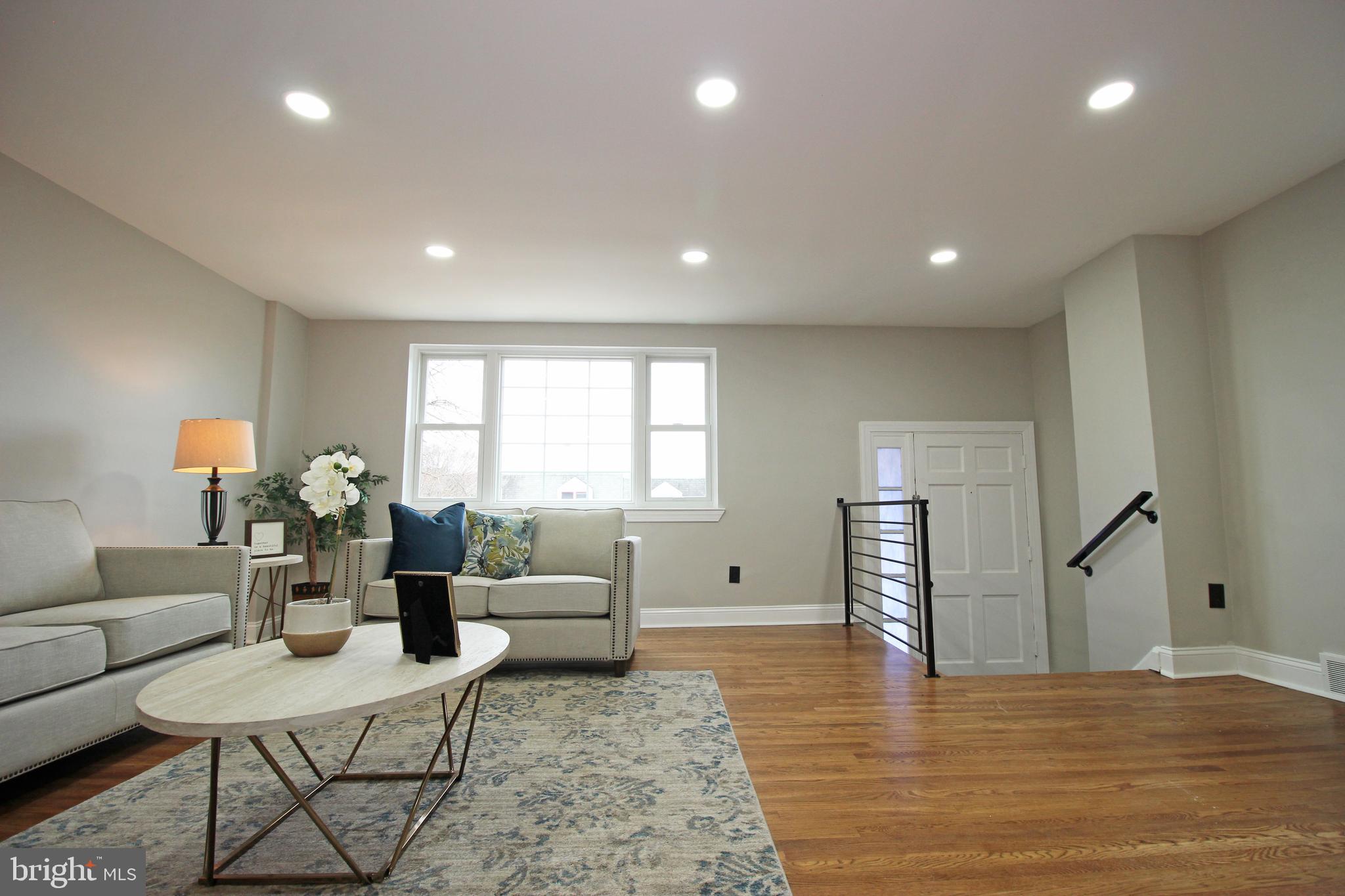 4017 Gideon Road Brookhaven, PA 19015 - Photo 13 of 54 a living room with furniture and a wooden floor