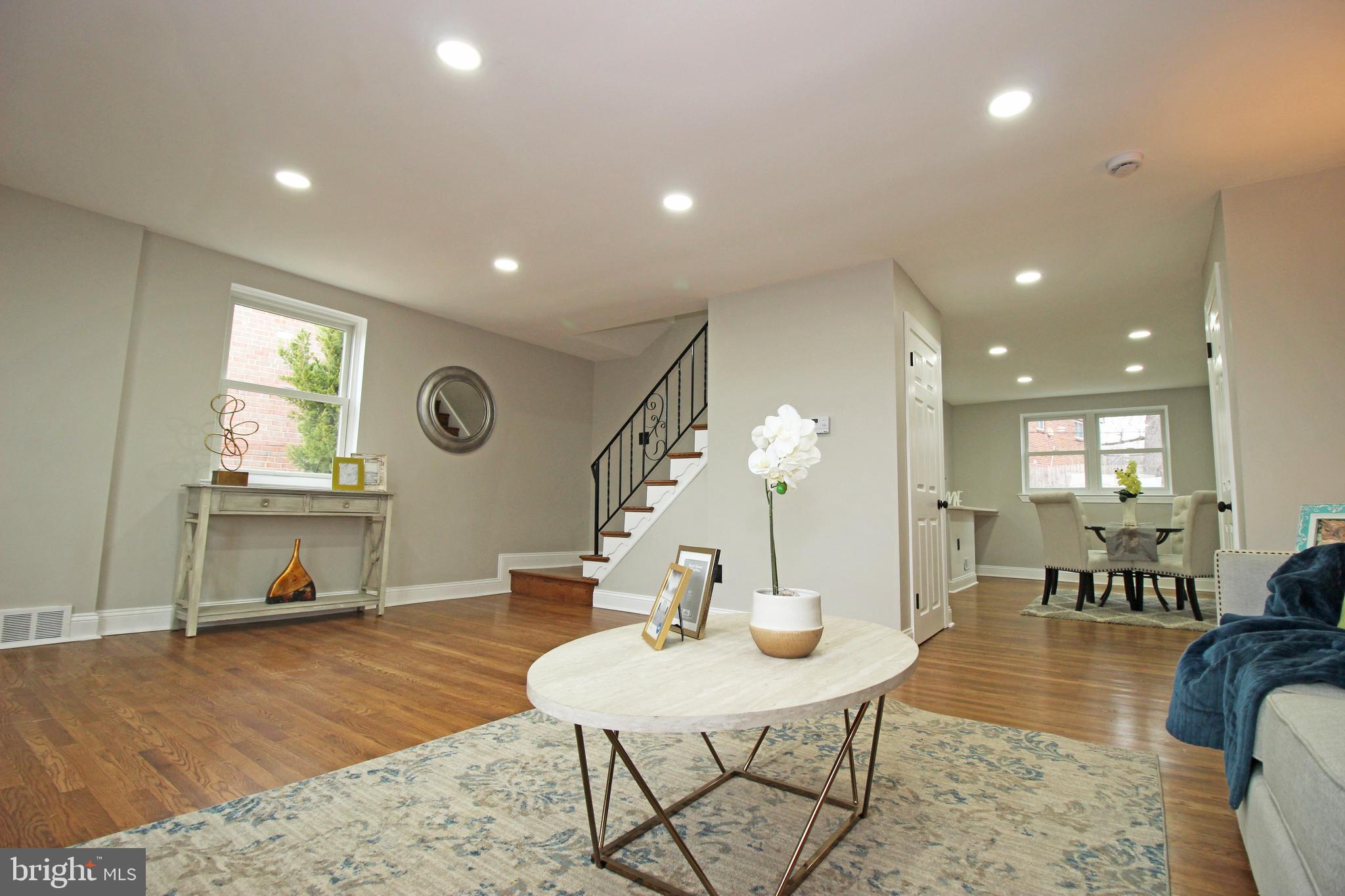 4017 Gideon Road Brookhaven, PA 19015 - Photo 15 of 54 a living room with furniture a window and dining table