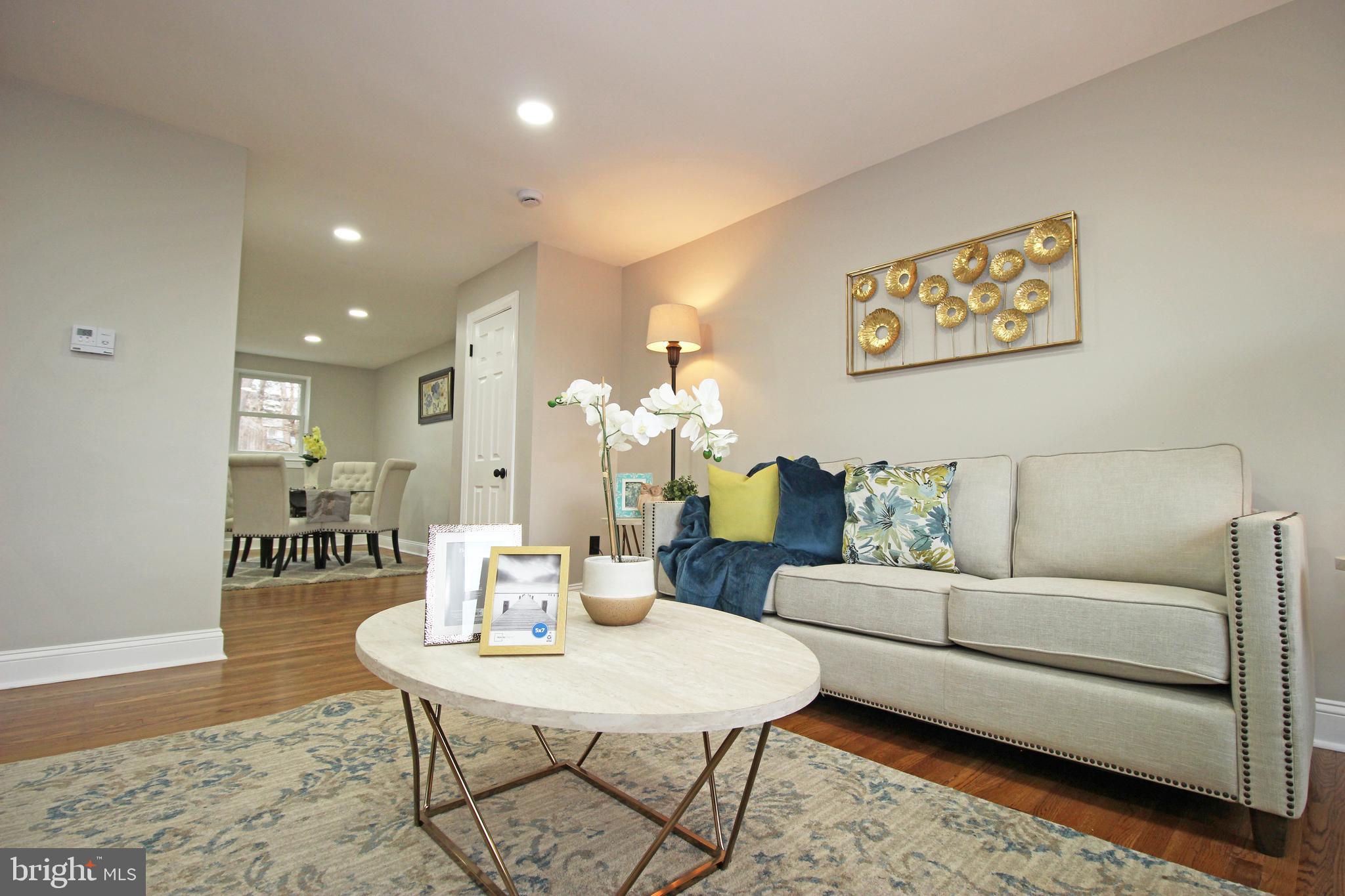 4017 Gideon Road Brookhaven, PA 19015 - Photo 16 of 54 a living room with furniture and a table
