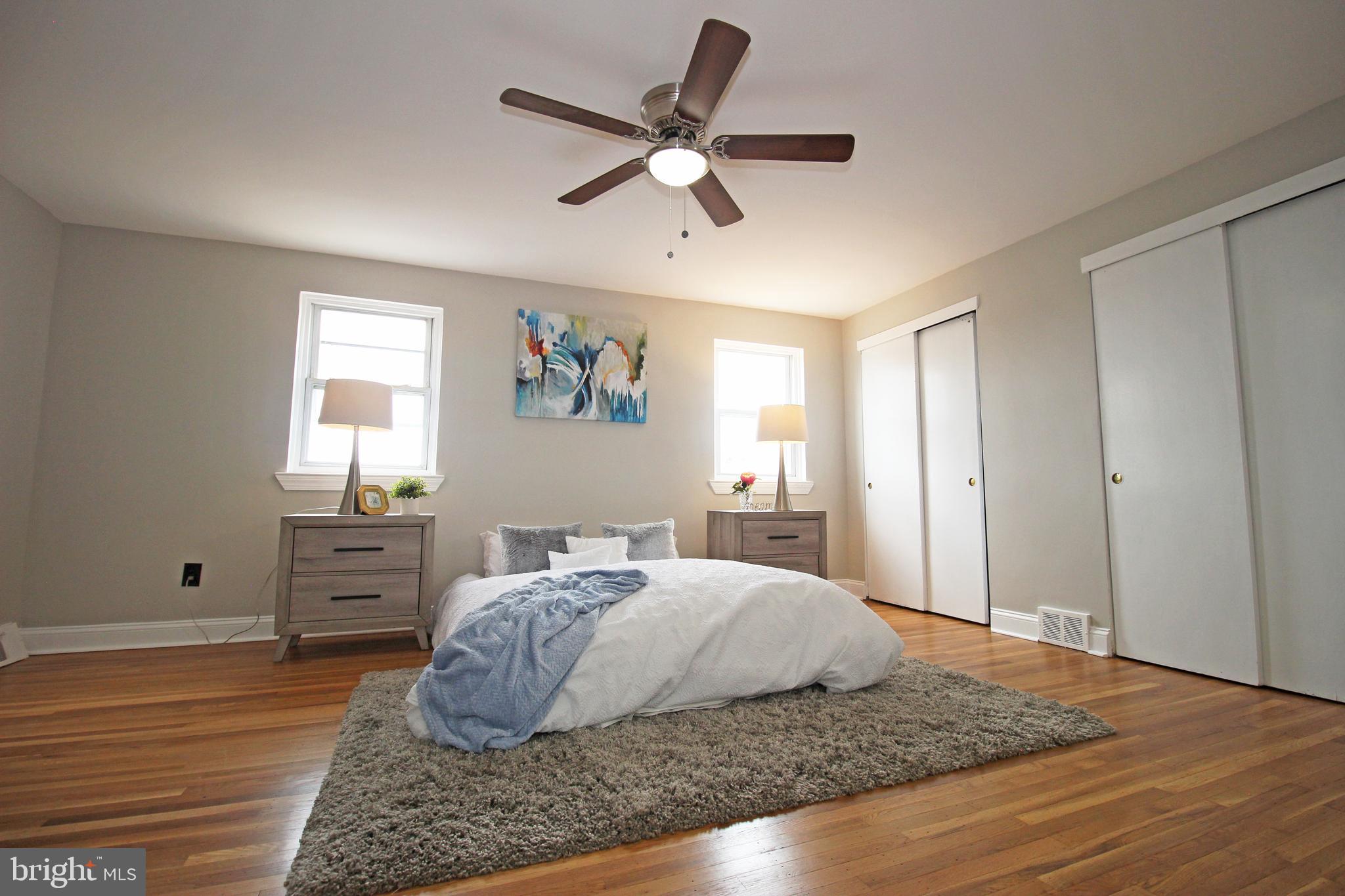 4017 Gideon Road Brookhaven, PA 19015 - Photo 31 of 54 a bedroom with a large bed and a window