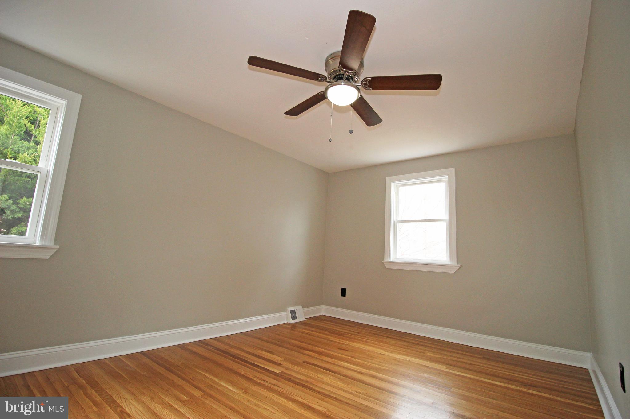 4017 Gideon Road Brookhaven, PA 19015 - Photo 37 of 54 a view of a room with a window and a ceiling fan
