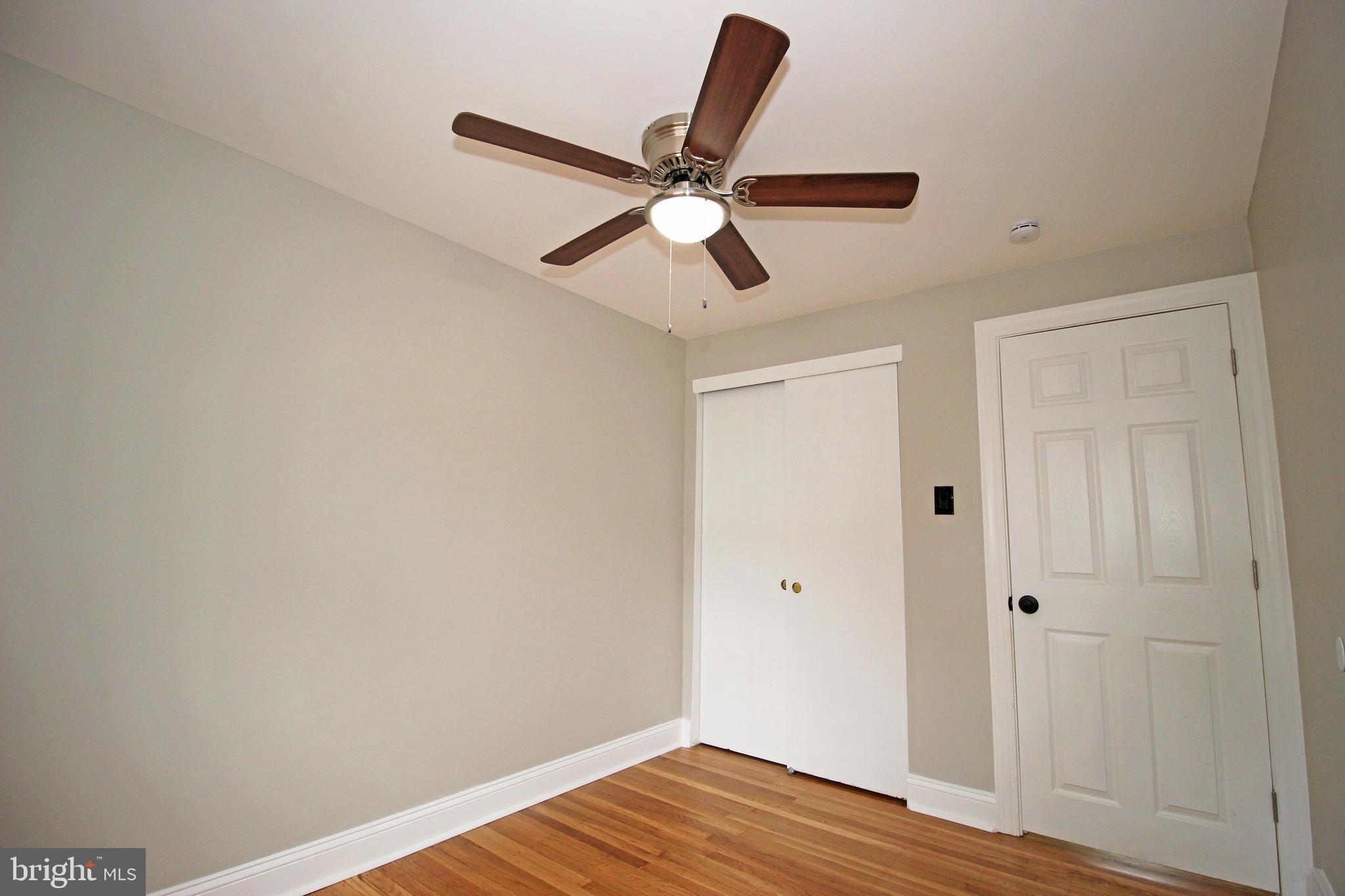 4017 Gideon Road Brookhaven, PA 19015 - Photo 41 of 54 a view of a room with wooden floor and a ceiling fan