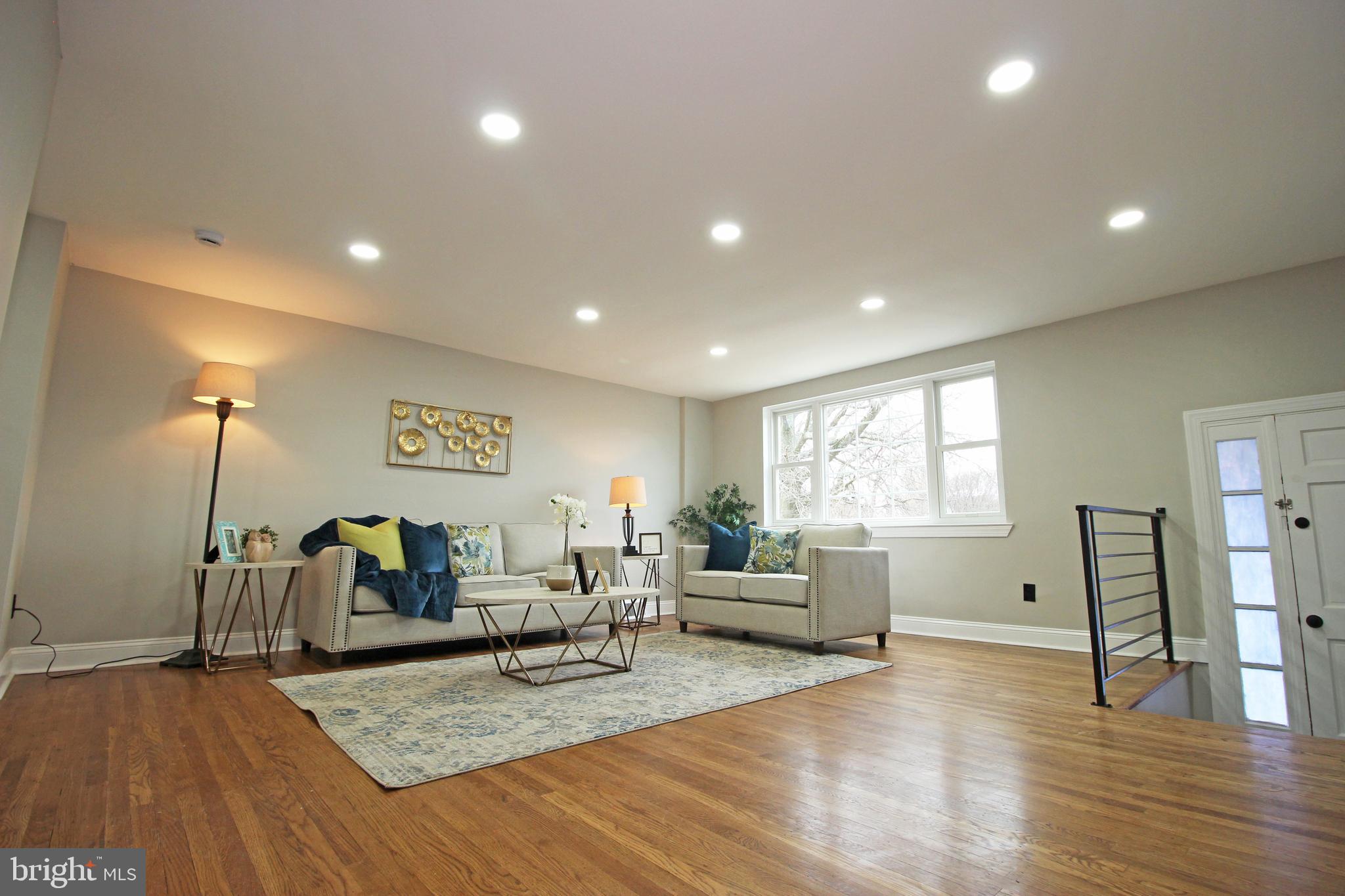 4017 Gideon Road Brookhaven, PA 19015 - Photo 5 of 54 a living room with furniture and a wooden floor