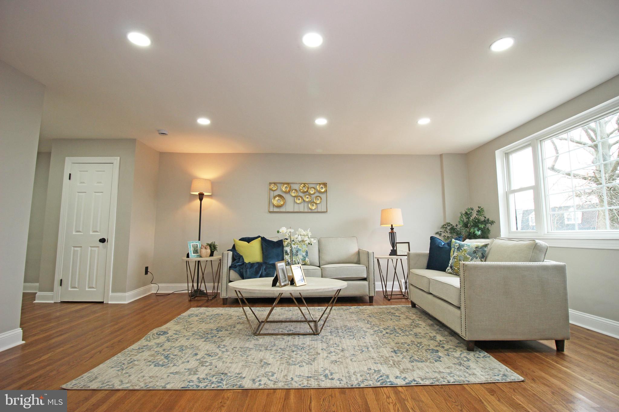 4017 Gideon Road Brookhaven, PA 19015 - Photo 6 of 54 a living room with furniture and a large window