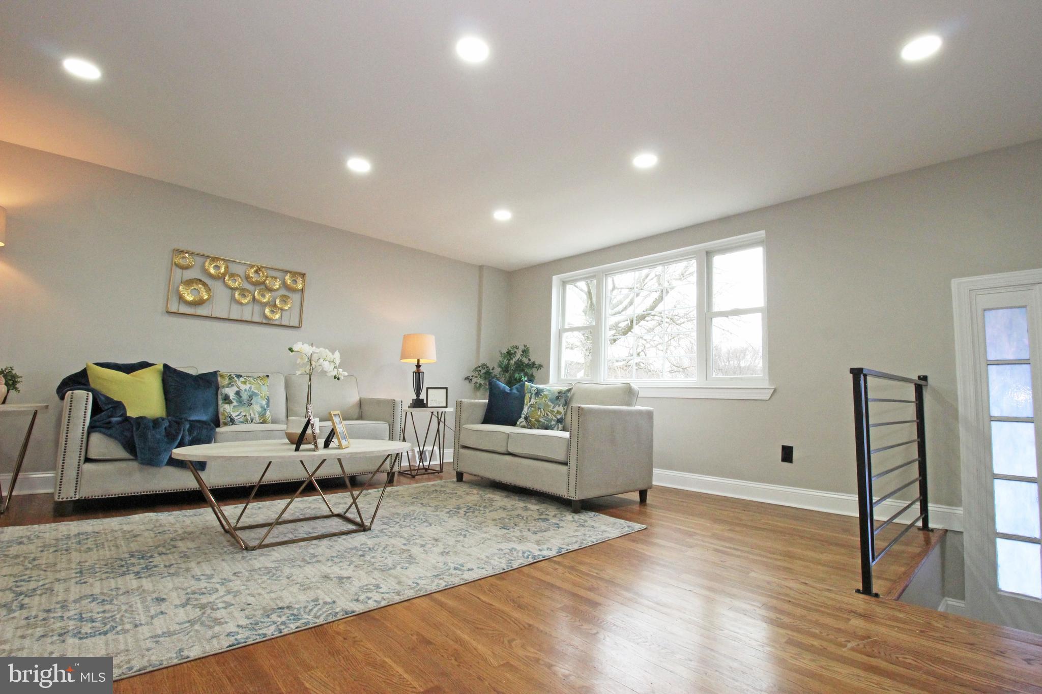 4017 Gideon Road Brookhaven, PA 19015 - Photo 8 of 54 a living room with furniture and a window