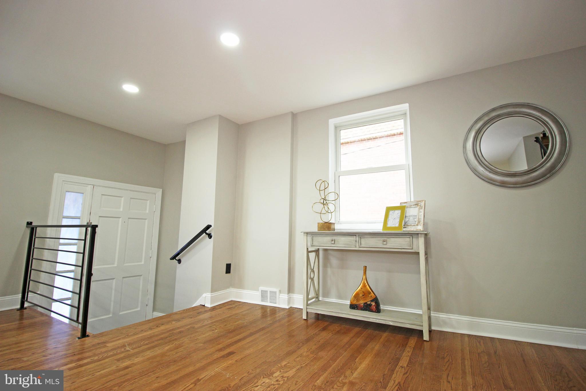 4017 Gideon Road Brookhaven, PA 19015 - Photo 10 of 54 a living room with furniture and a wooden floor