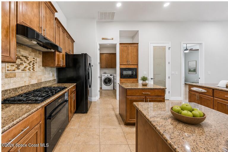 4355 Windover Way Melbourne, FL 32934 - Photo 5 of 68 staged_kitchen_view_2