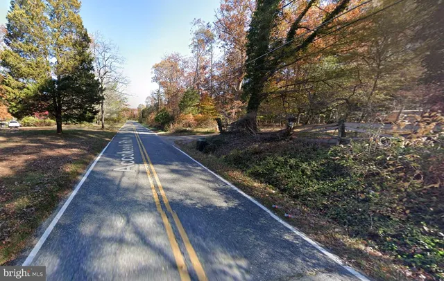 a view of backyard with green space