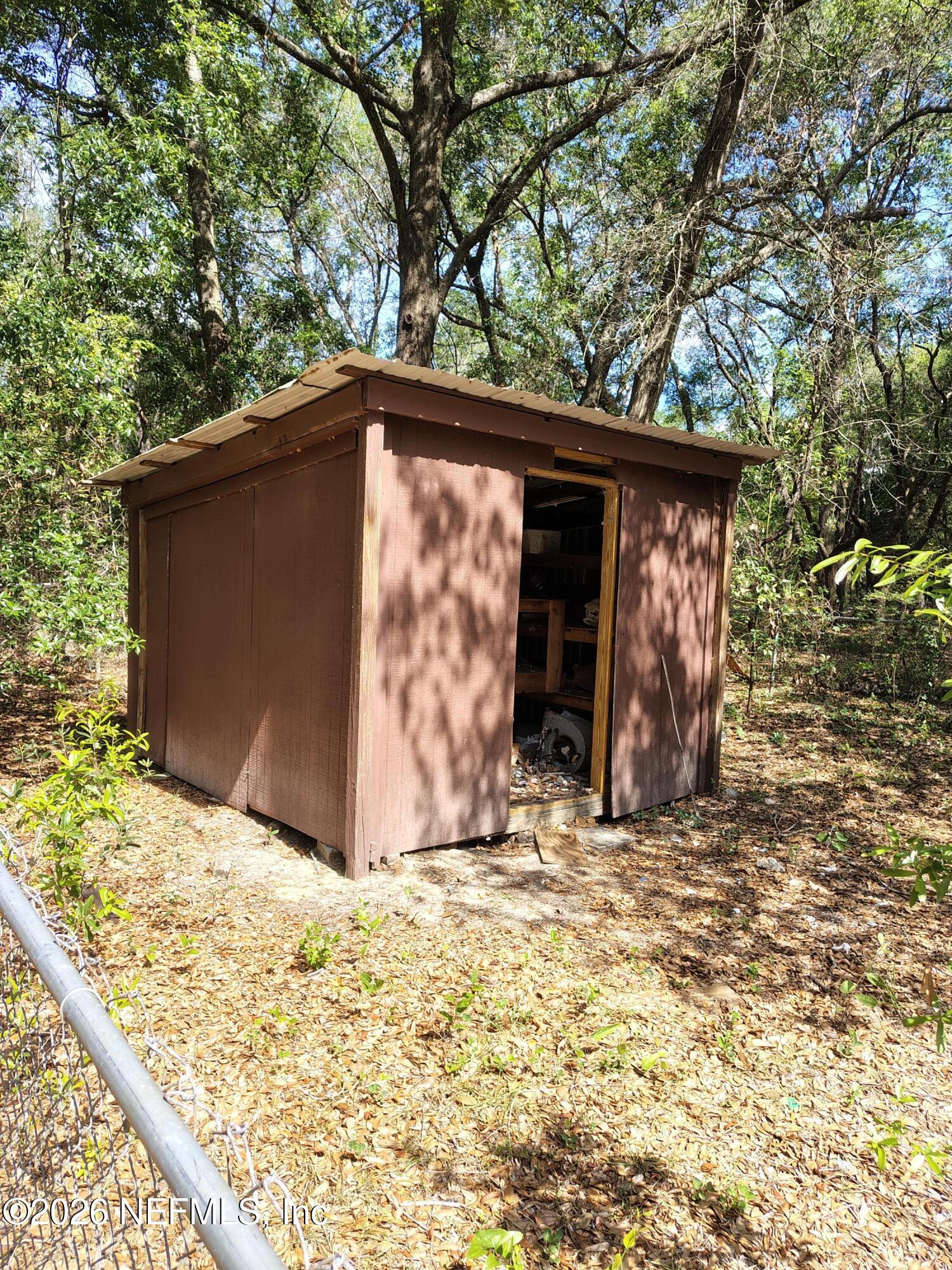 7202 Notre Dame Street Keystone Heights, FL 32656 - Photo 5 of 16 a view of wooden fence