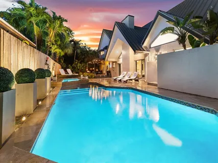 swimming pool view with a outdoor space