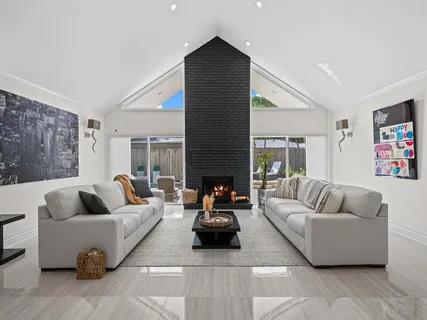 a living room with furniture and a couch