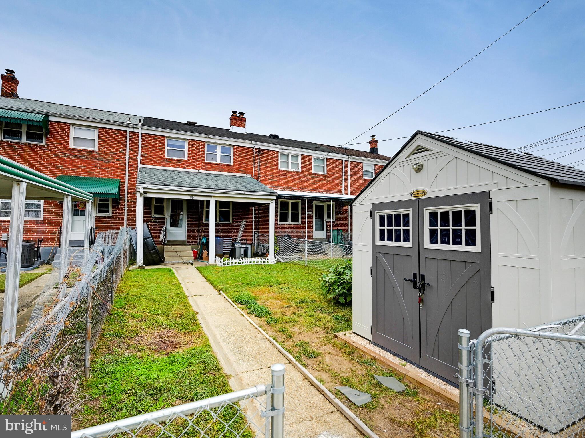 2017 Wareham Road Baltimore, MD 21222 - Photo 34 of 36 Fenced in yard with shed