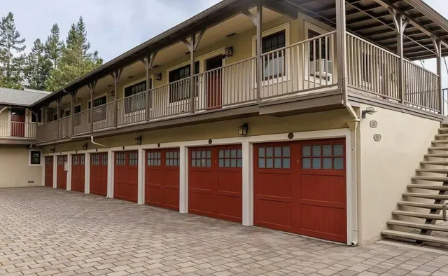 a view of a large building with wooden stairs