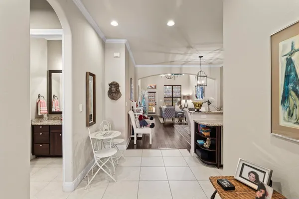 a living room with lots of furniture and a window