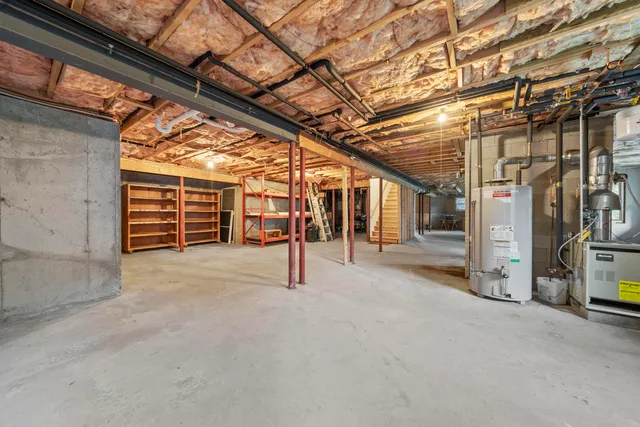 a view of a room with wooden walls