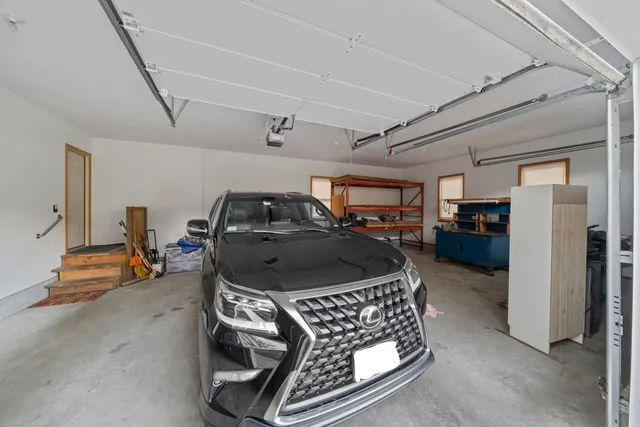 a bed room with a bed and a gym