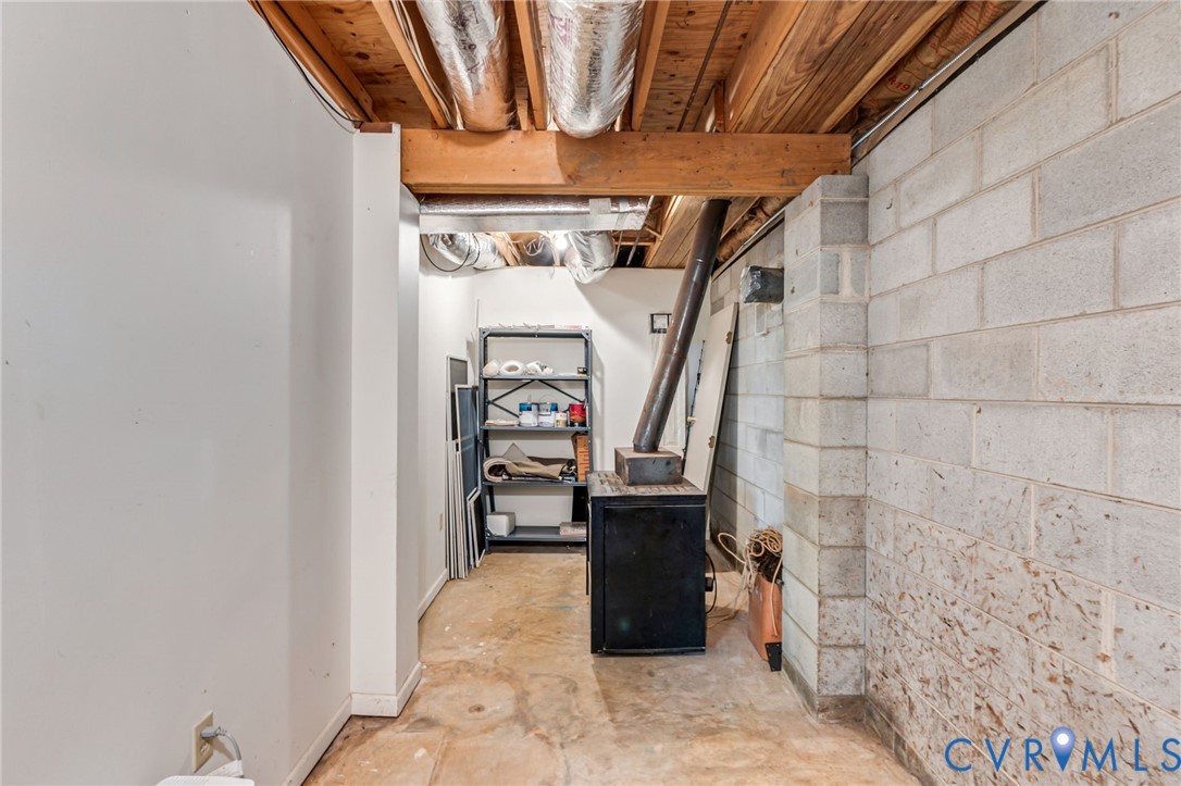 71 Old Mill Road Dillwyn, VA 23936 - Photo 28 of 31 Unfinished basement space with walk-out door leadi