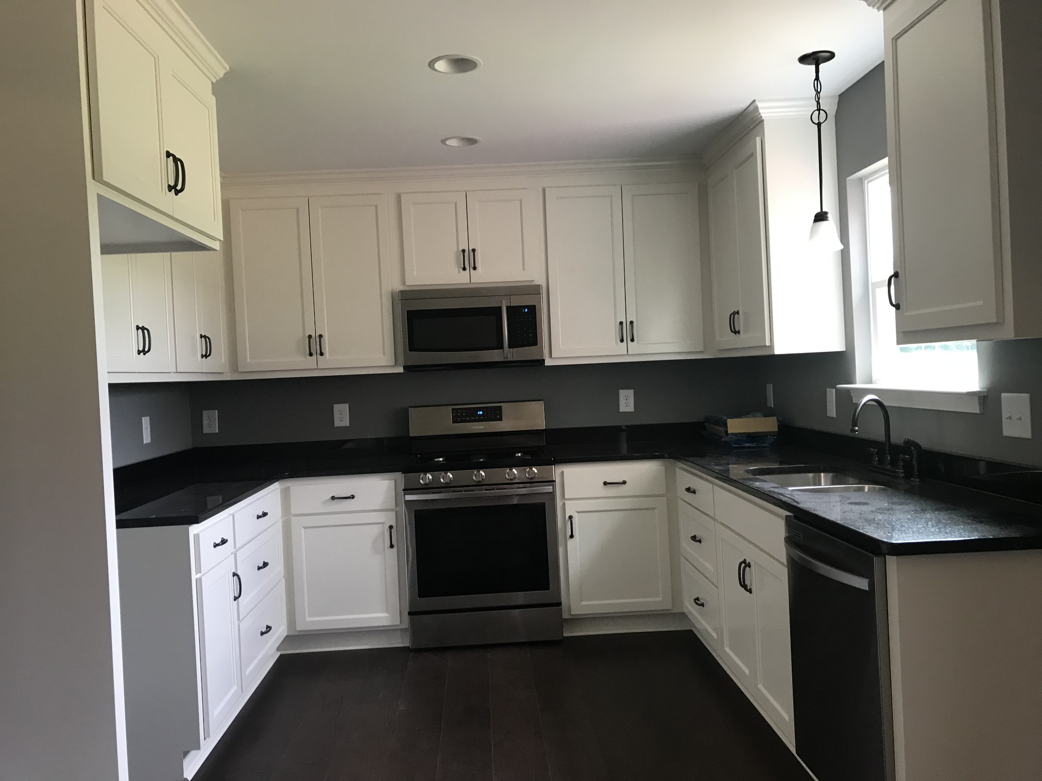 461 Pruett Road Dickson, TN 37055 - Photo 6 of 20 a kitchen with stainless steel appliances granite countertop white cabinets sink and dishwasher