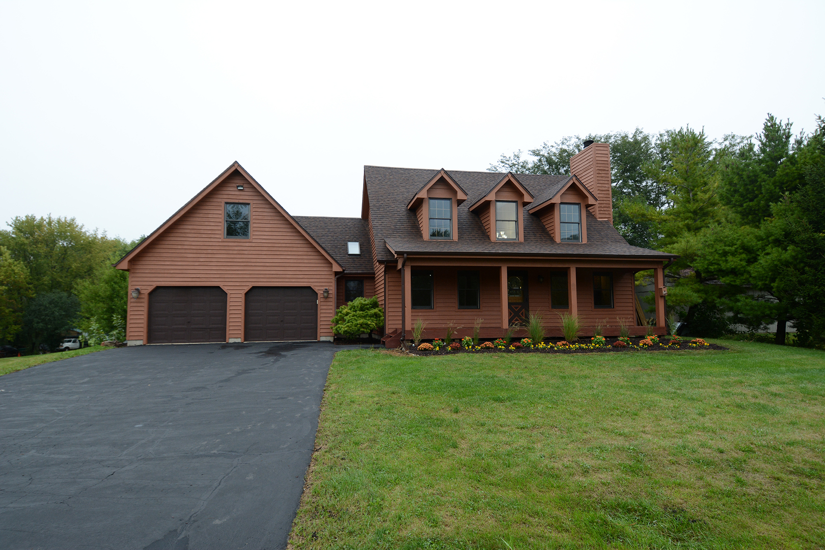 44W290 Plank Road Hampshire, IL 60140 - Photo 2 of 31 a front view of a house with a garden