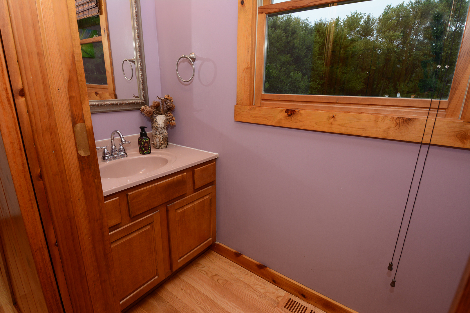 44W290 Plank Road Hampshire, IL 60140 - Photo 25 of 31 a bathroom with a sink and a mirror