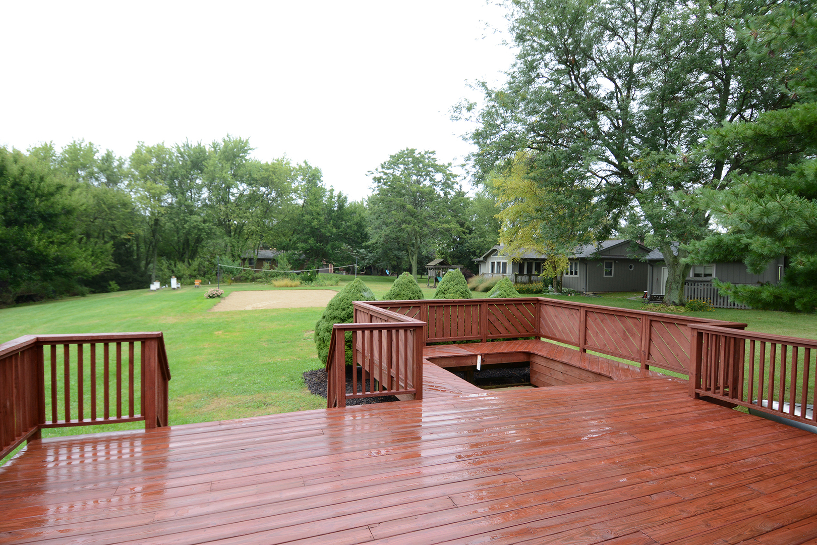 44W290 Plank Road Hampshire, IL 60140 - Photo 27 of 31 a view of deck with chairs and wooden fence