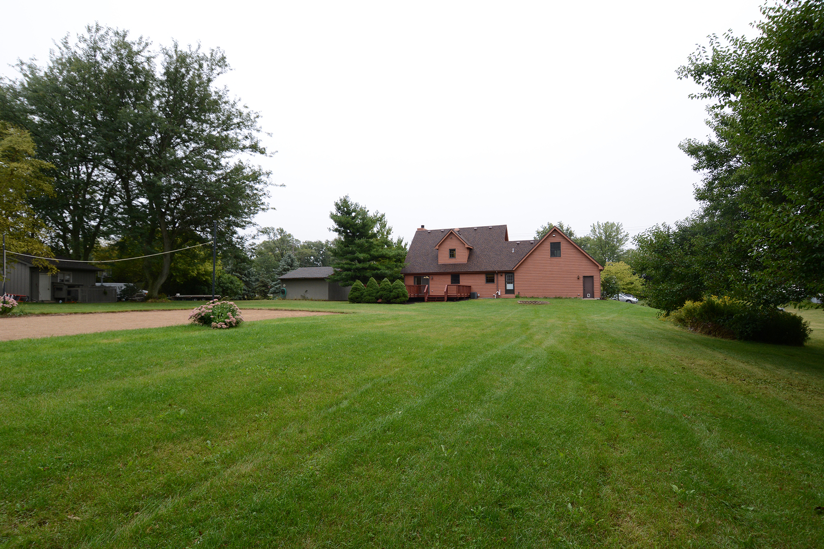 44W290 Plank Road Hampshire, IL 60140 - Photo 31 of 31 a view of a tiny house with a yard