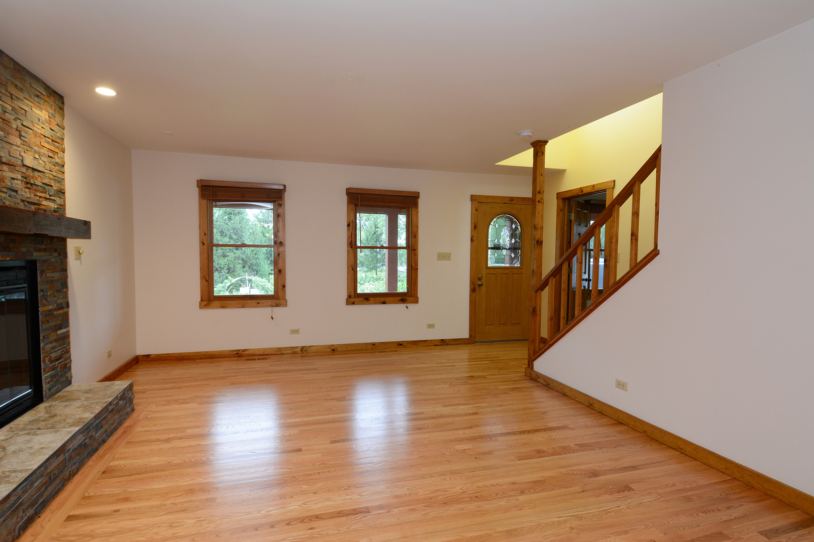 44W290 Plank Road Hampshire, IL 60140 - Photo 6 of 31 an empty room with wooden floor and windows