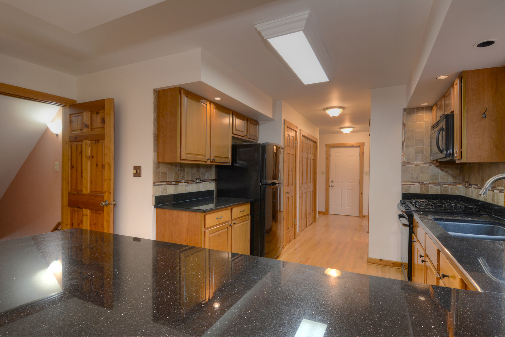 44W290 Plank Road Hampshire, IL 60140 - Photo 10 of 31 a kitchen with stainless steel appliances granite countertop a refrigerator and a stove top oven