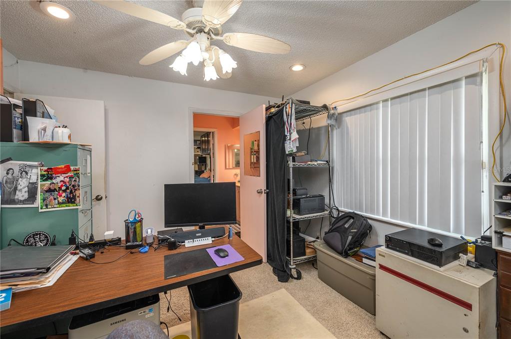 305 Hernando Road Winter Haven, FL 33884 - Photo 22 of 32 a room with furniture and a window