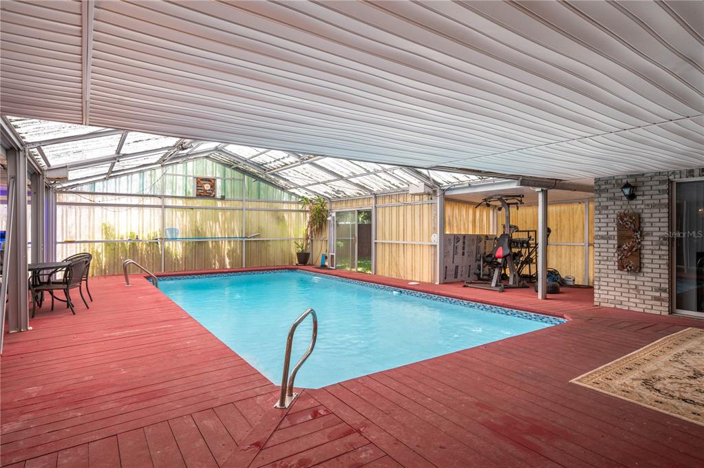 305 Hernando Road Winter Haven, FL 33884 - Photo 29 of 32 a view of a swimming pool with a patio