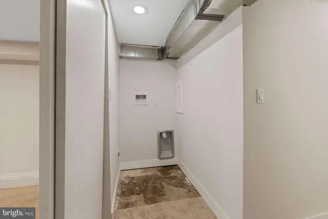 a front view of a house with glass windows