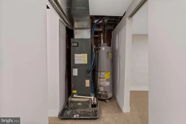 a view of a house with brick walls