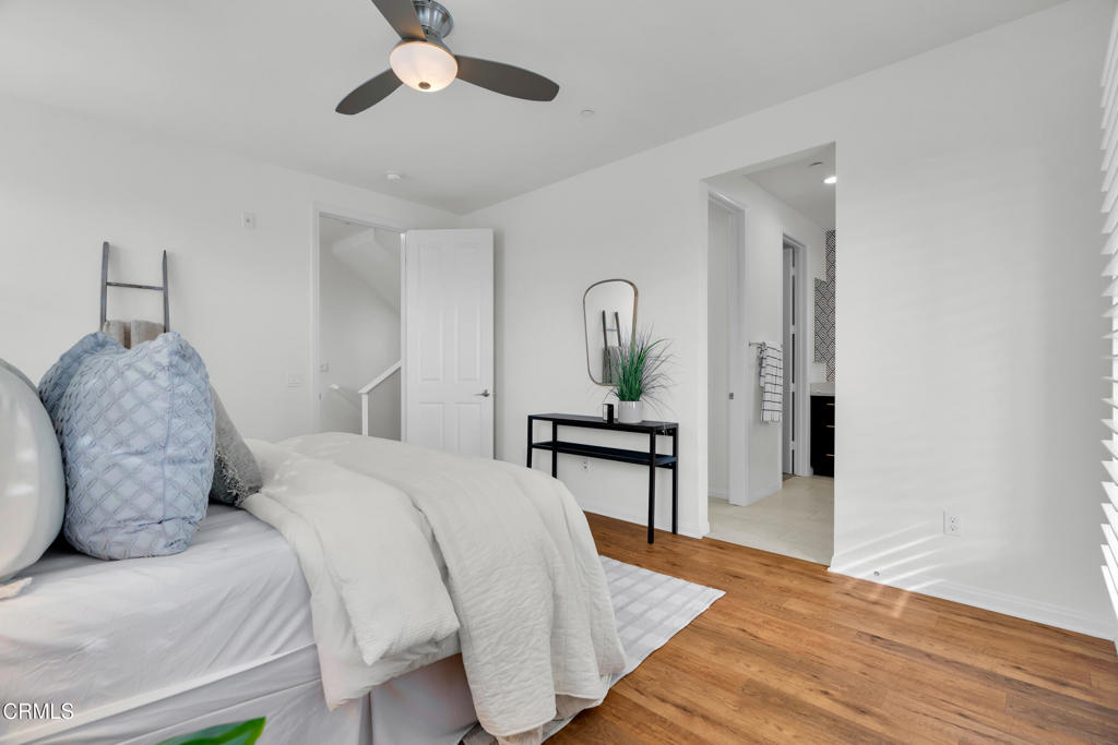 900 North Primrose Lane, Unit A Azusa, CA 91702 - Photo 20 of 55 a bedroom with a bed and a table