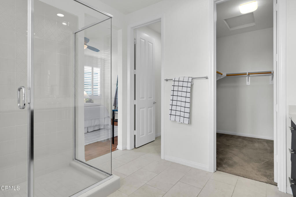 900 North Primrose Lane, Unit A Azusa, CA 91702 - Photo 25 of 55 a view of a bathroom with a glass door shower