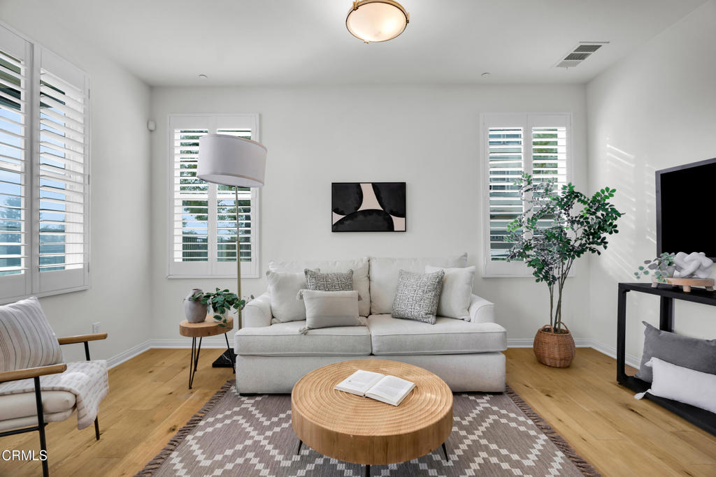 900 North Primrose Lane, Unit A Azusa, CA 91702 - Photo 6 of 55 a living room with furniture potted plant and a window