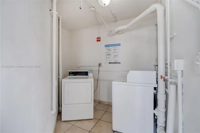 a view of a building with a yard and palm trees