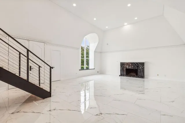 a view of entryway with stairs and a window