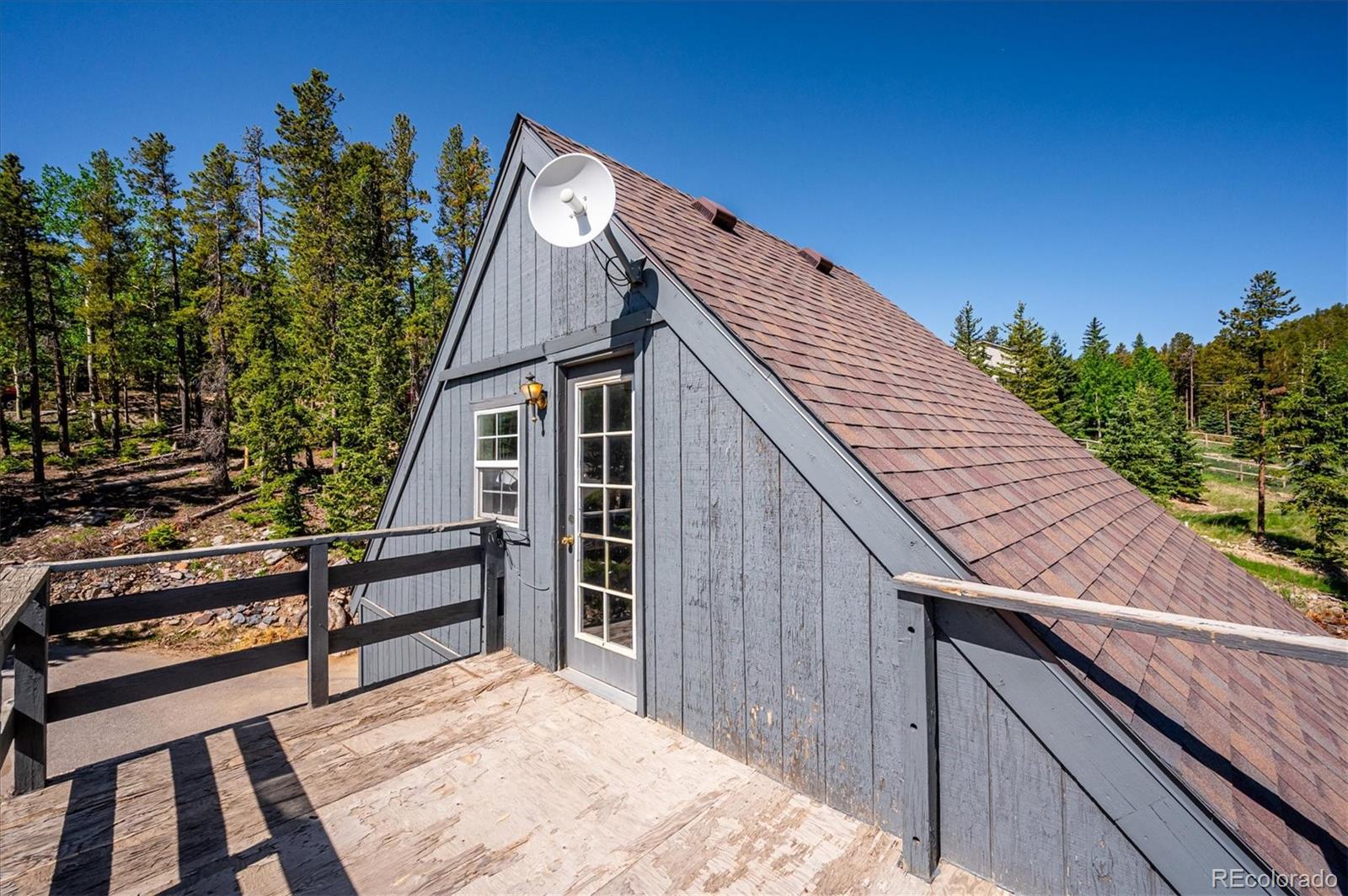 1633 Sinton Road Evergreen, CO 80439 - Photo 44 of 50 a view of outdoor space and deck