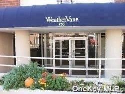 750 Shore Road, Unit 4N Long Beach, NY 11561 - Photo 1 of 14 a front view of a building