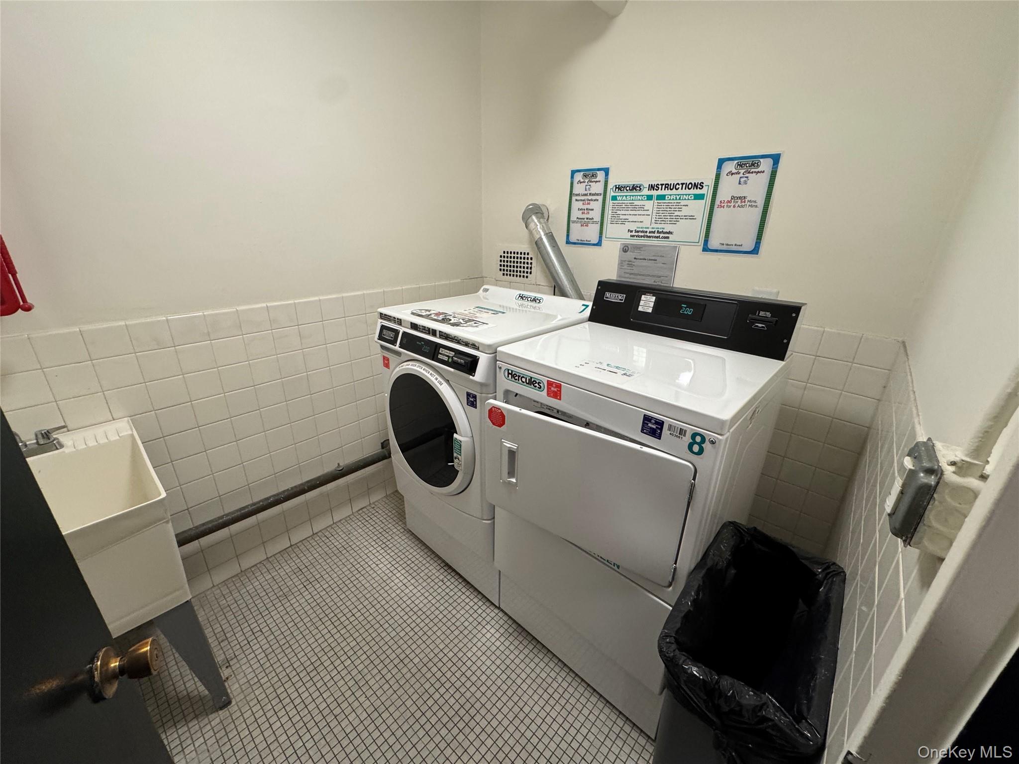 750 Shore Road, Unit 4N Long Beach, NY 11561 - Photo 13 of 14 a utility room with dryer and washer
