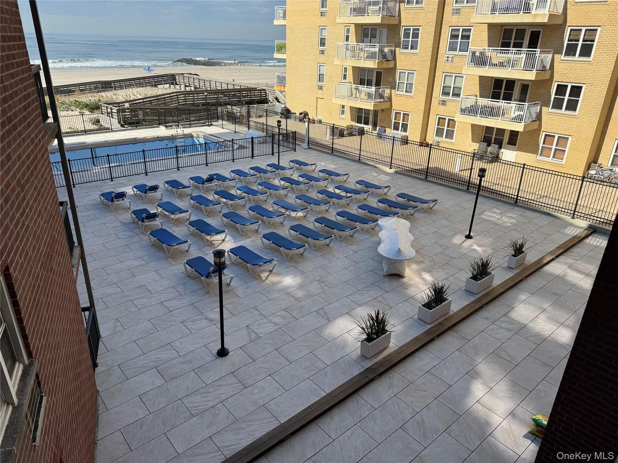 750 Shore Road, Unit 4N Long Beach, NY 11561 - Photo 6 of 14 a view of a living room with furniture
