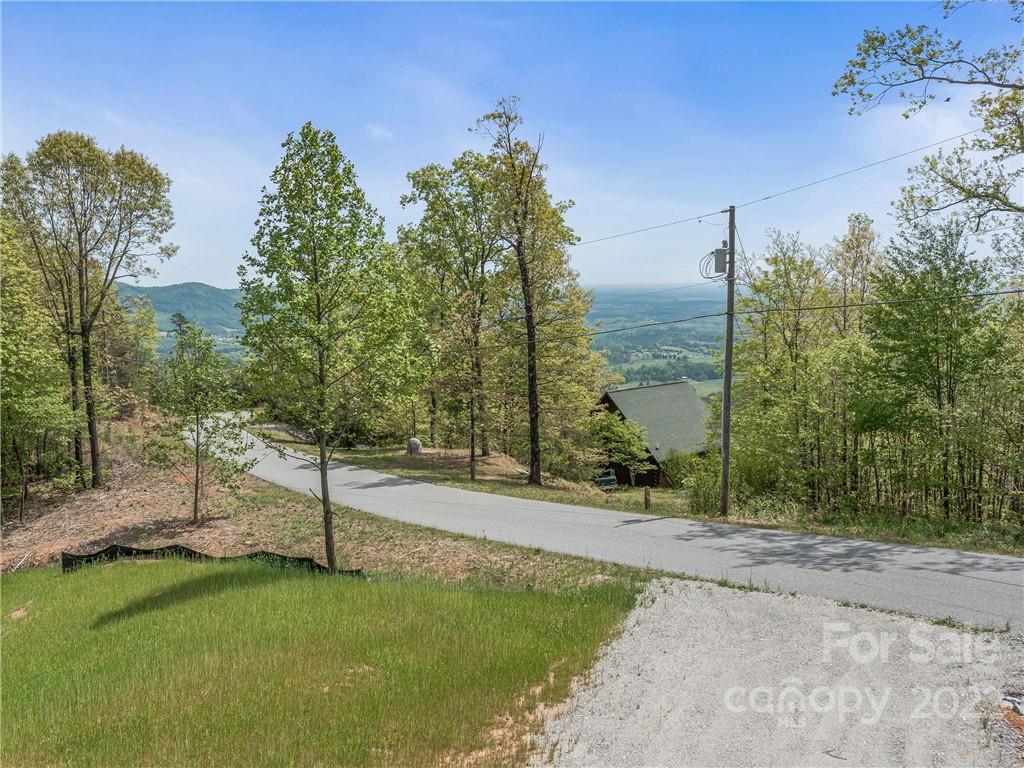 116 Inspiration Ridge Drive Bostic, NC 28018 - Photo 2 of 33 a backyard of a house with lots of green space