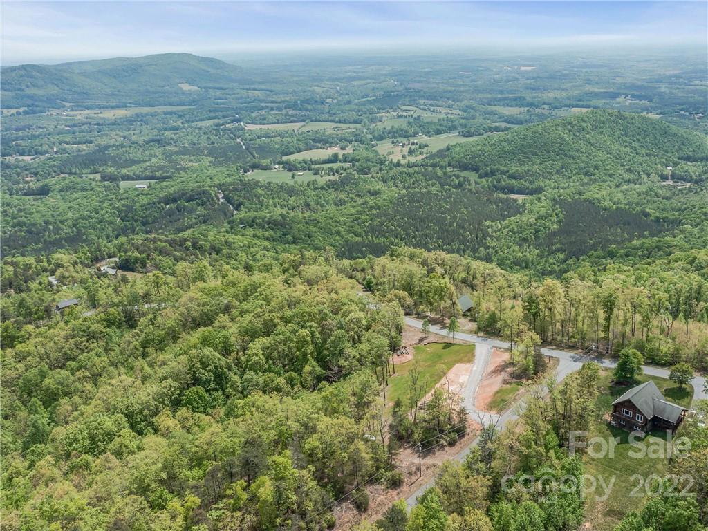 116 Inspiration Ridge Drive Bostic, NC 28018 - Photo 22 of 33 a view of a lake in middle of forest