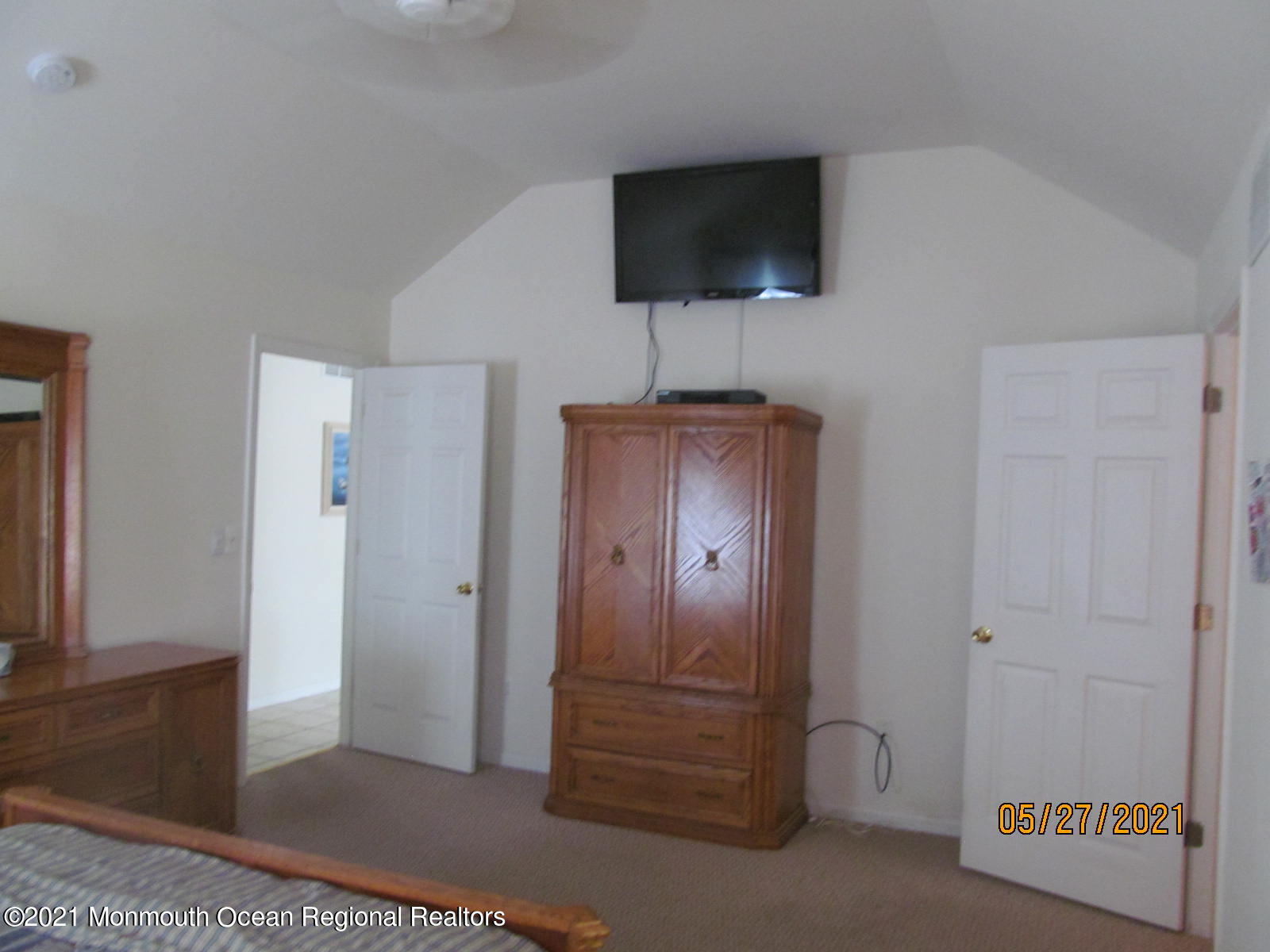 133 Compass Road Manahawkin, NJ 08050 - Photo 14 of 27 a view of a livingroom with a flat screen tv