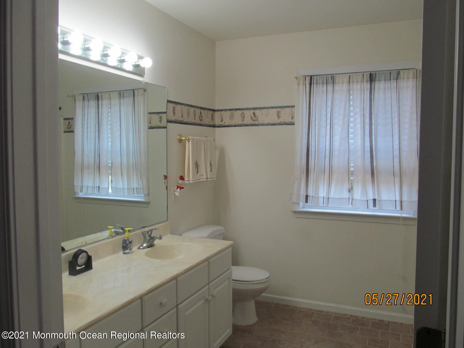 133 Compass Road Manahawkin, NJ 08050 - Photo 15 of 27 a bathroom with a sink toilet and shower