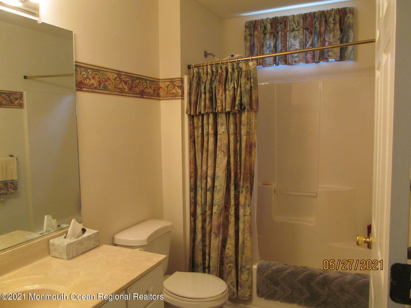 133 Compass Road Manahawkin, NJ 08050 - Photo 19 of 27 a bathroom with a sink toilet and shower