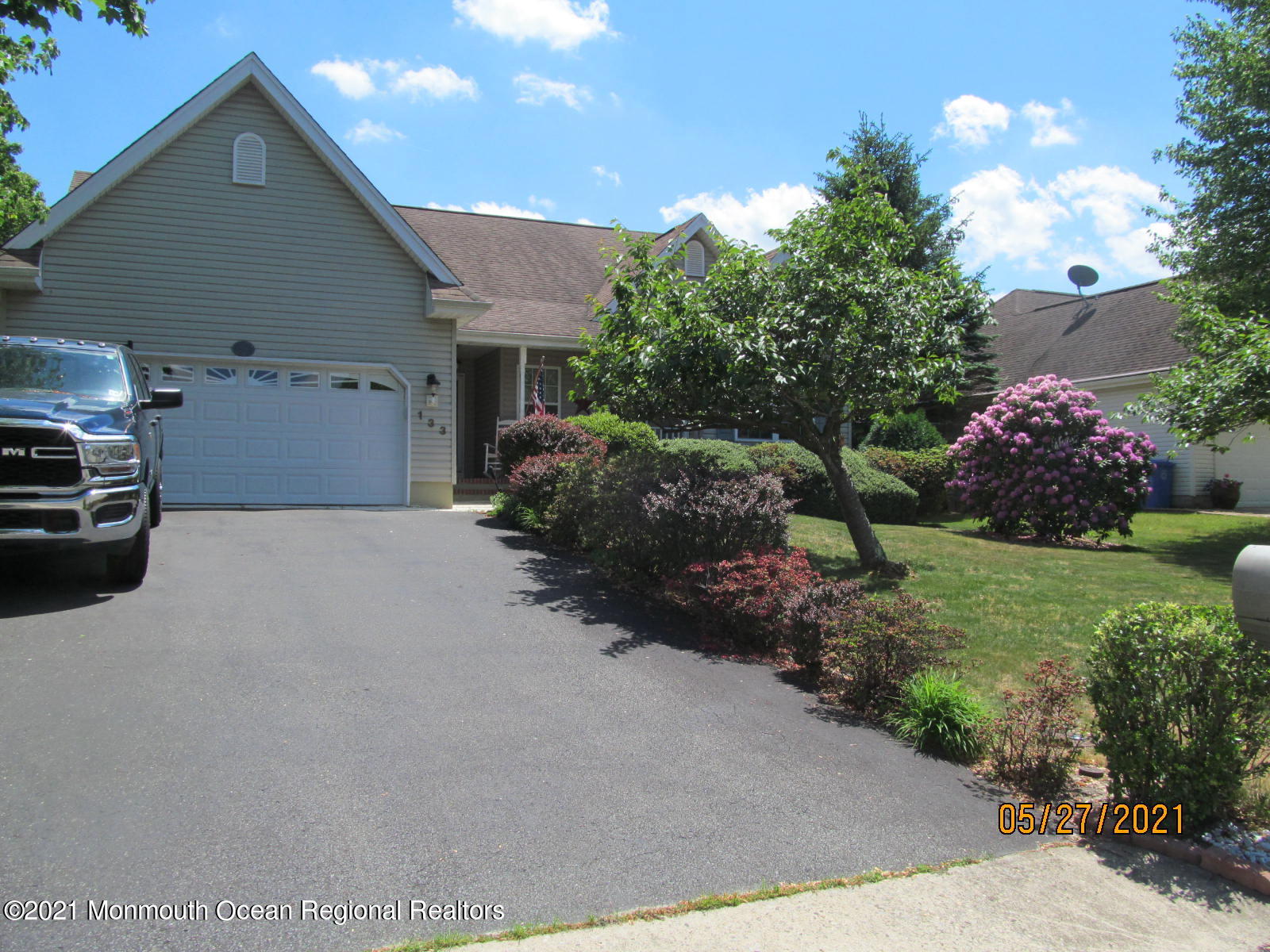 133 Compass Road Manahawkin, NJ 08050 - Photo 3 of 27 a view of a house with a garden